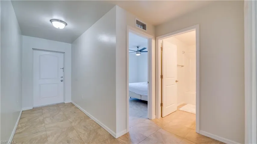 Front Door & View of Guest Room, Bath