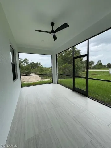 Back Porch with screening lanai, Unfurnished sunroom with a ceiling fan and plenty of natural light