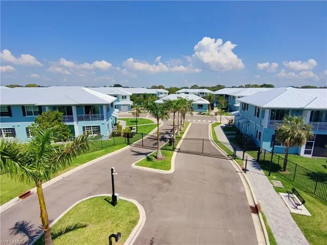 Surrounding community featuring a residential view and fence