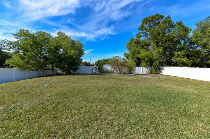 View of fenced backyard