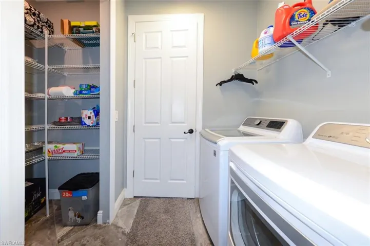 Laundry room with separate washer and dryer