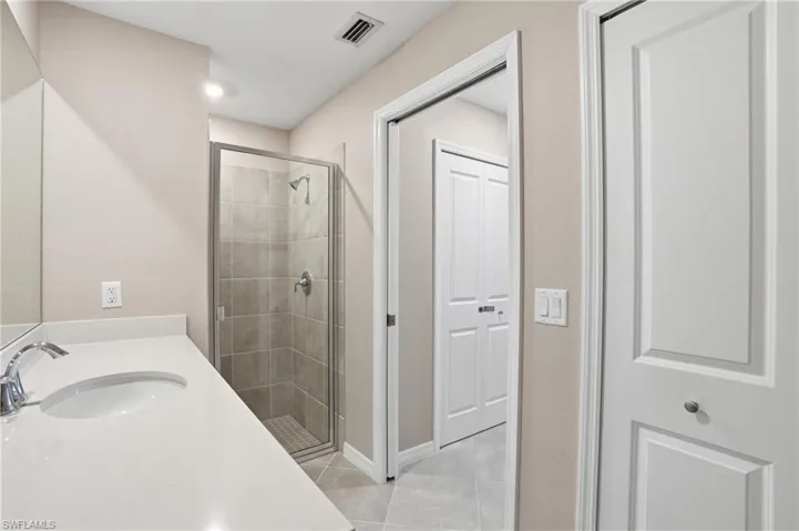 Primary bathroom with linen closet