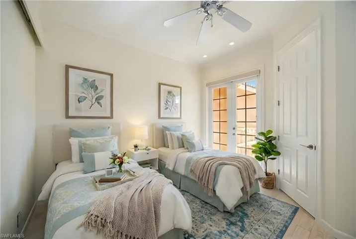 Bedroom with french doors, ornamental molding, wood finished floors, recessed lighting, and a ceiling fan