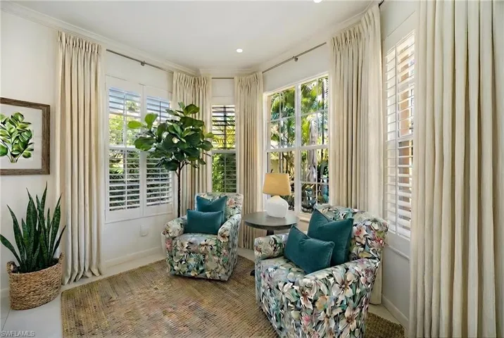 Living area featuring baseboards