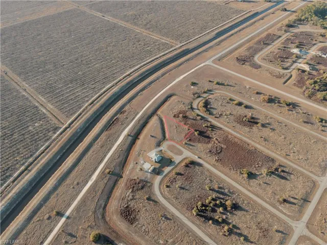 Aerial view of property and surrounding area with rural landscape