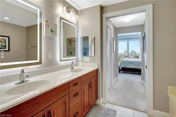 Bathroom featuring vanity and tile patterned flooring