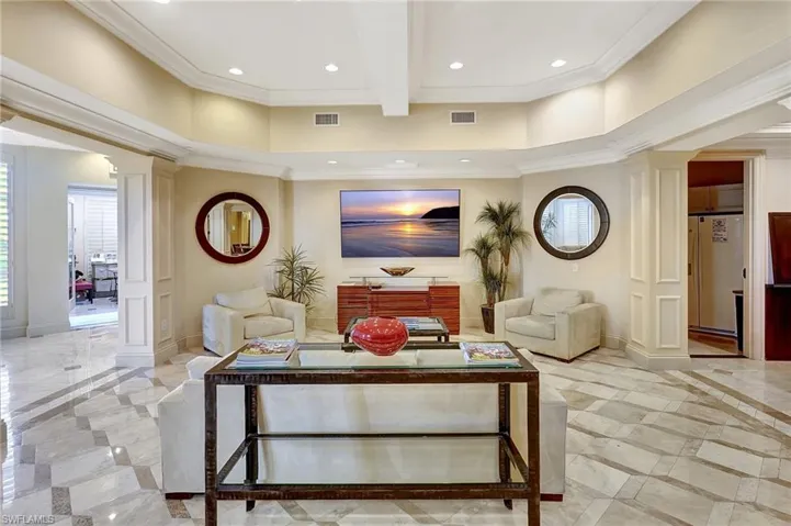 Living room with ornamental molding common area