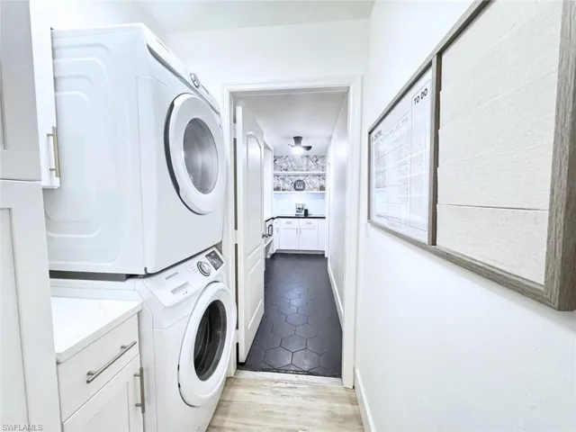 Laundry room with included washer and dryer