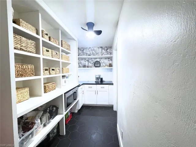 Walk-in pantry with ample storage