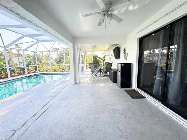 Entertaining space enclosed in lanai with new screens and doors (2024/2025).