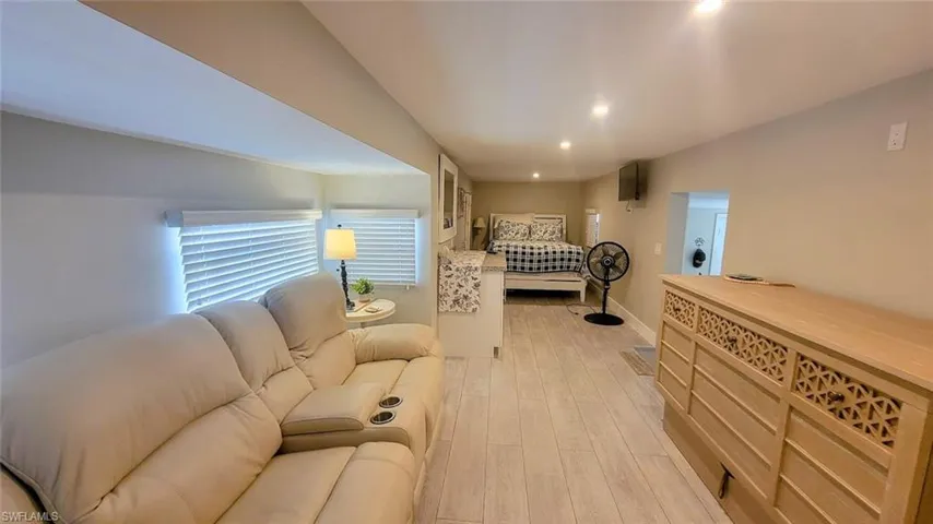 Bedroom featuring light wood-style floors and recessed lighting