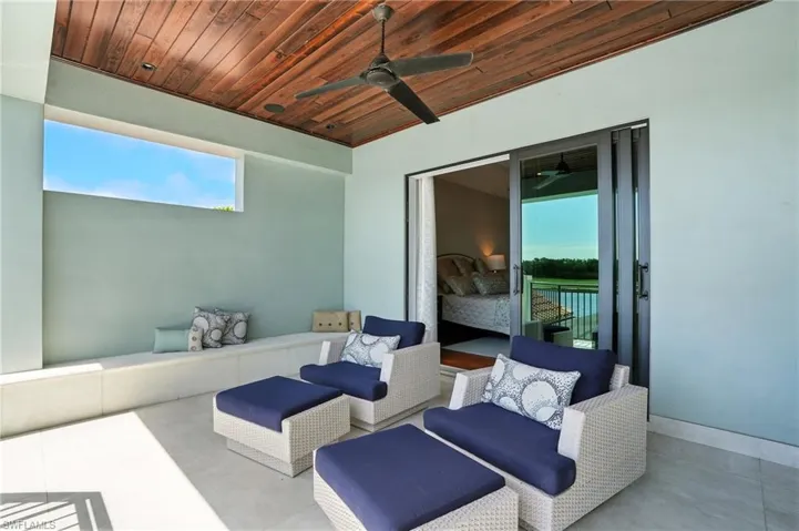 View of patio / terrace with a ceiling fan and outdoor lounge area