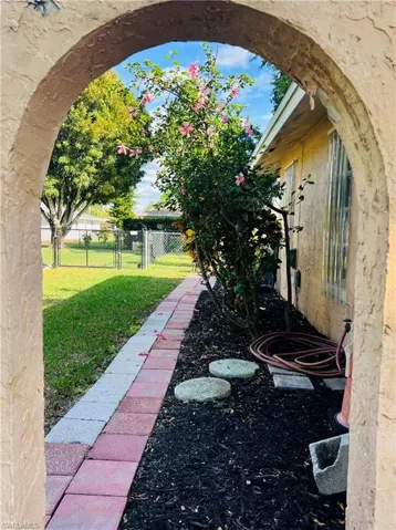 View of yard featuring a gate
