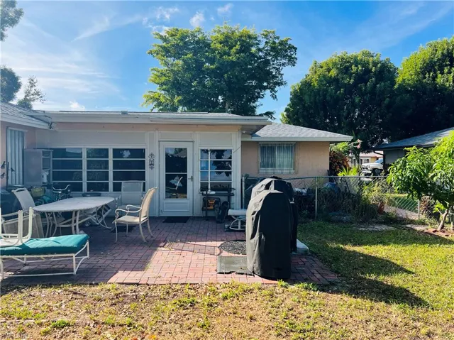 Rear view of property featuring a patio