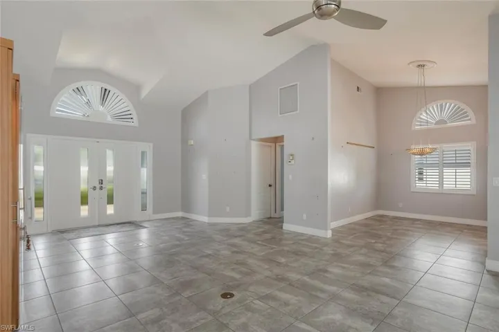 Bright, open entry way plus separate dining.
