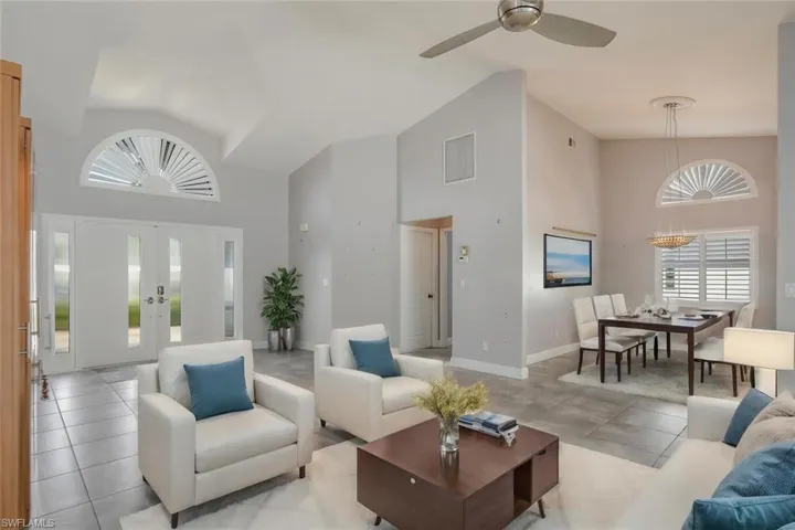 Bright, open living room and dining room.