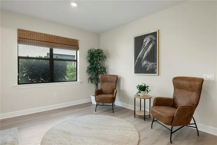 Living area featuring light hardwood / wood-style floors