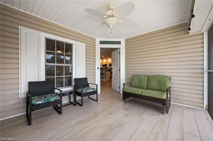 Wooden terrace with ceiling fan
