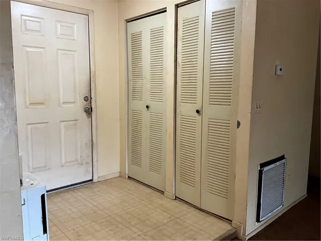 Front Entry into (small step down) to living area. Nice entry closet space.