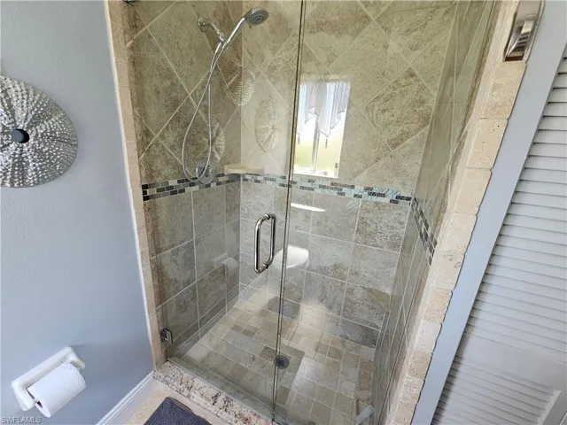Bathroom with a shower glass door