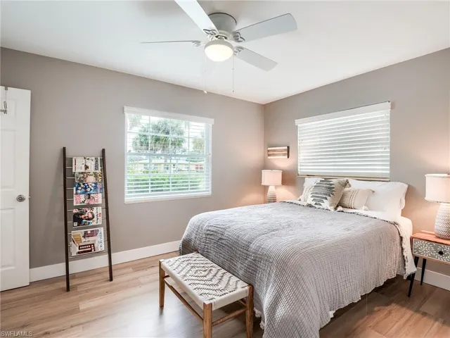 Guest bedroom with attached half bathroom
