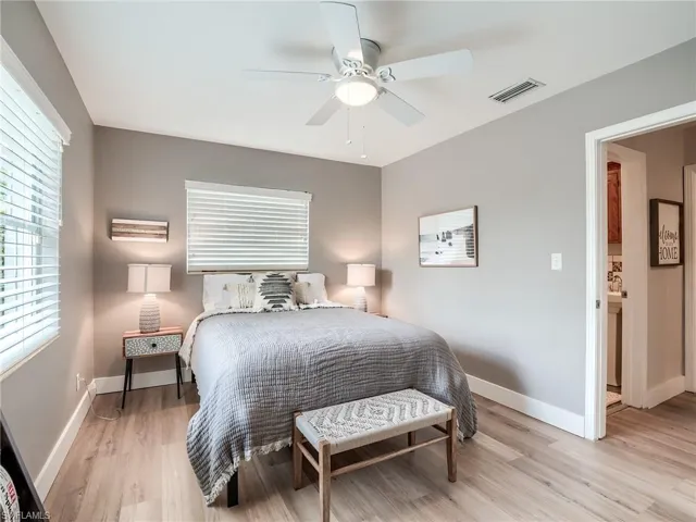Bedroom featuring ceiling fan and light wood-type flooring