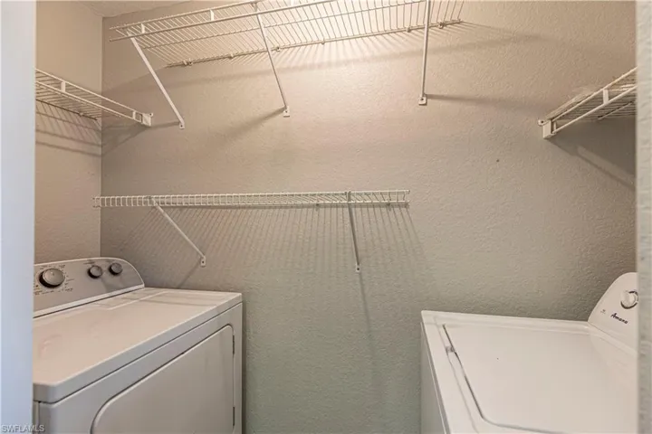 Laundry room includes washer and dryer.