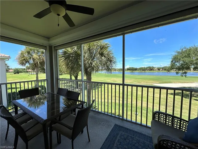 Sunroom/View featuring ceiling fan