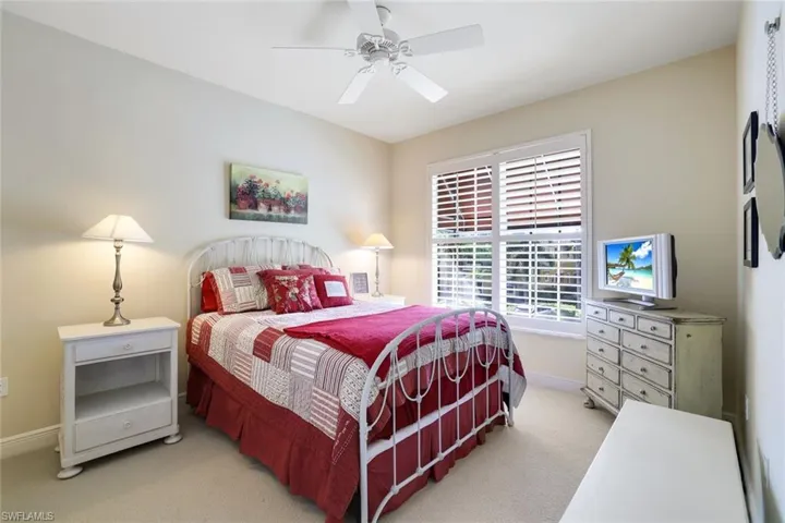 Guest bedroom #2 with wonderful walk-in closet great for air conditioned  storage!