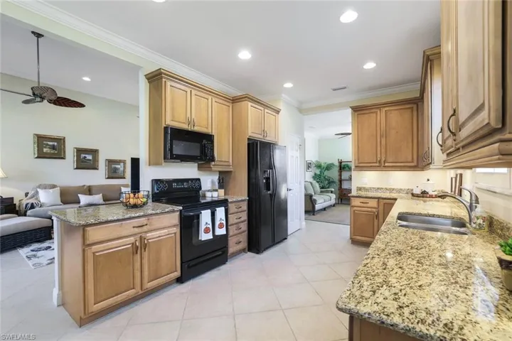 Kitchen open to Dining, Living and Den spaces!