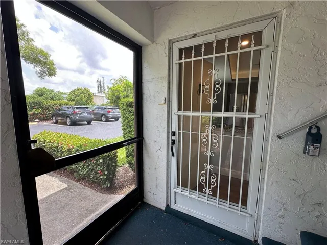 Community "I-1" with its  Hurricane Windowing and I-1 Condo Entrance Screendoor