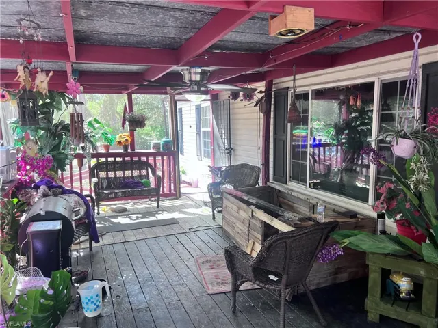 Wooden deck with ceiling fan
