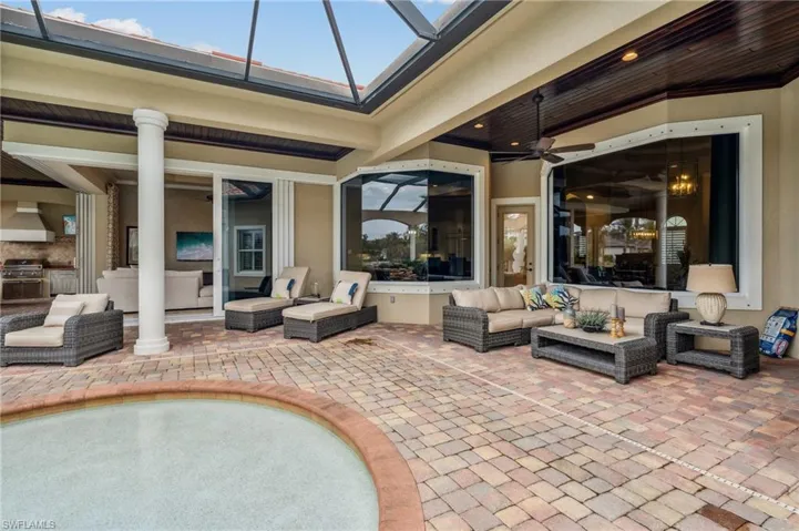 View of patio / terrace with ceiling fan and an outdoor hangout area