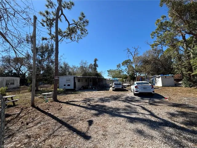 View of front facade featuring a storage unit