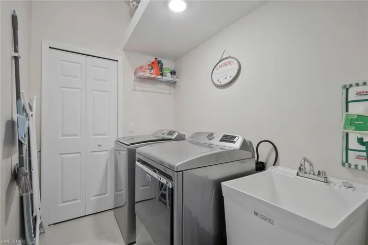 Laundry area featuring washer and clothes dryer