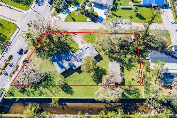 ariel of lot in red, adjacent county lot in yellow