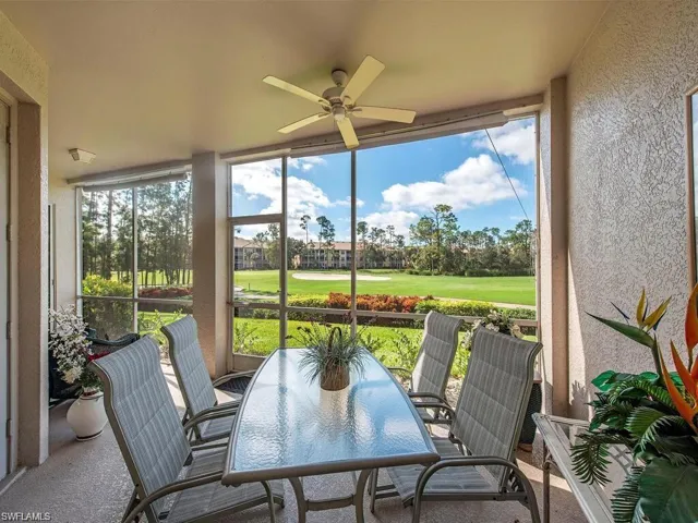 Sunroom / solarium with view of golf course