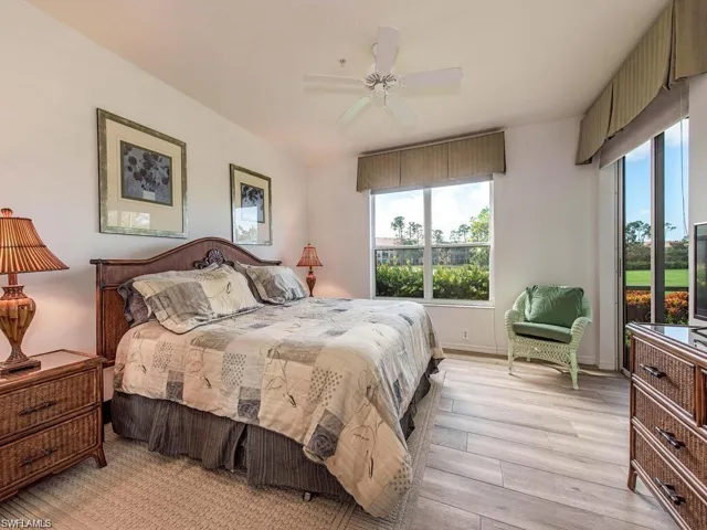 Bedroom with light wood-style flooring and ceiling fan