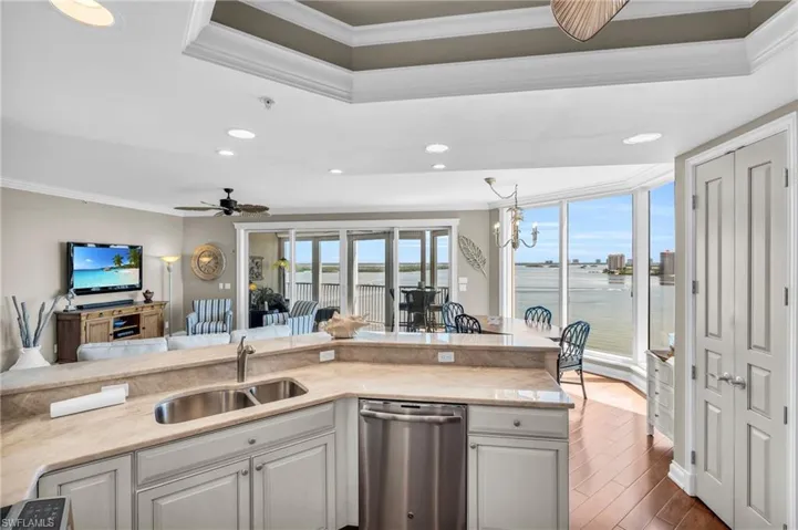 View from kitchen of the fabulous views, dining area, lanai and family area