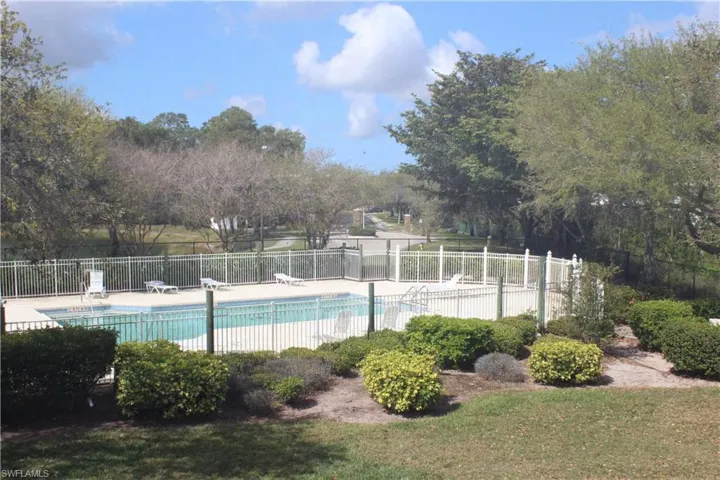 View from 2nd Floor Window, Pool featuring a patio area and fence