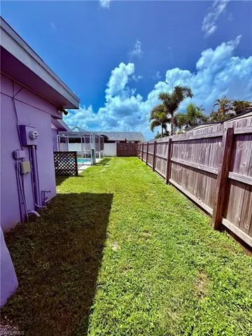 View of fenced backyard