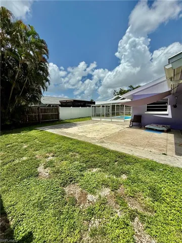 Fenced yard featuring a patio area