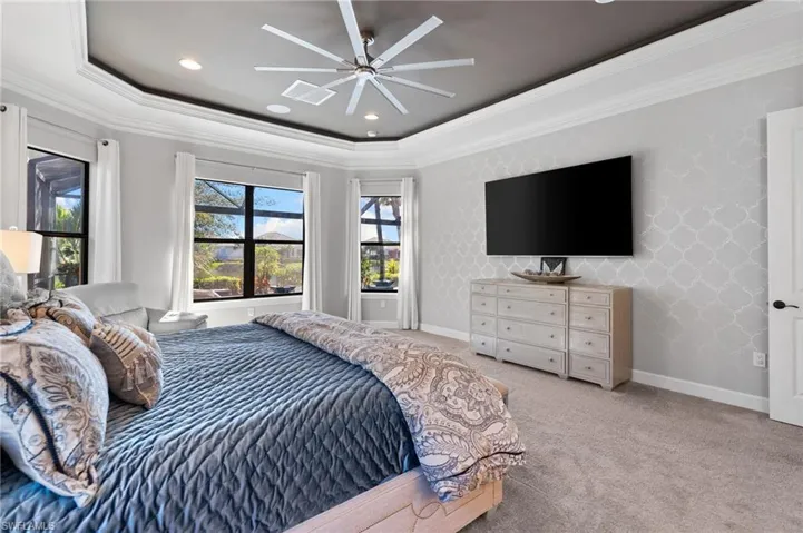 Bedroom featuring crown molding, carpet, ceiling fan, and recessed lighting