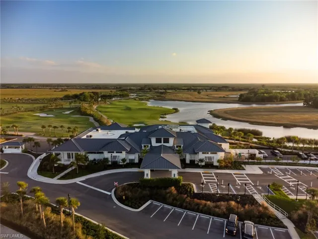 Drone / aerial view of a large body of water and a golf club