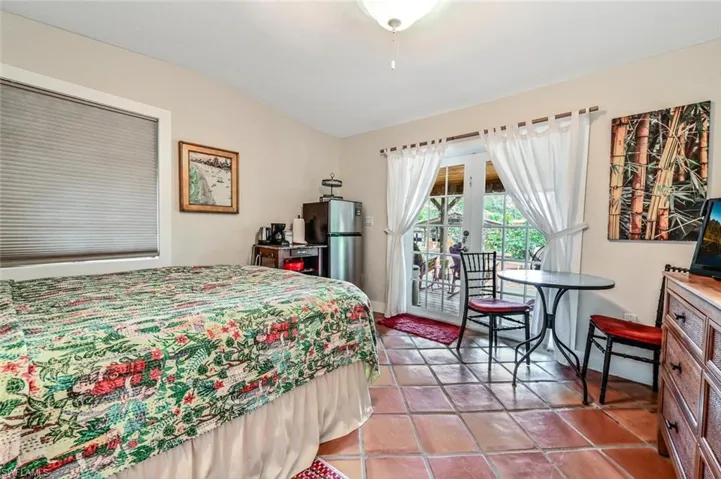 Bedroom set up as efficiency with french doors to veranda