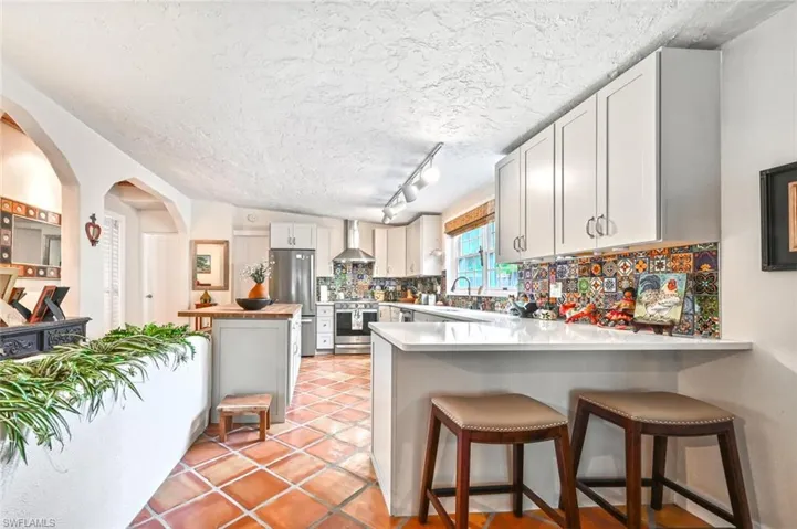 Kitchen with bar