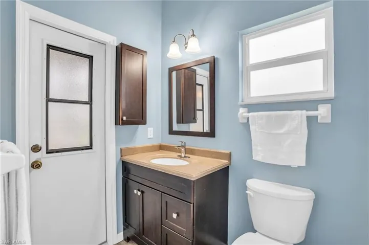 Bathroom featuring toilet and vanity