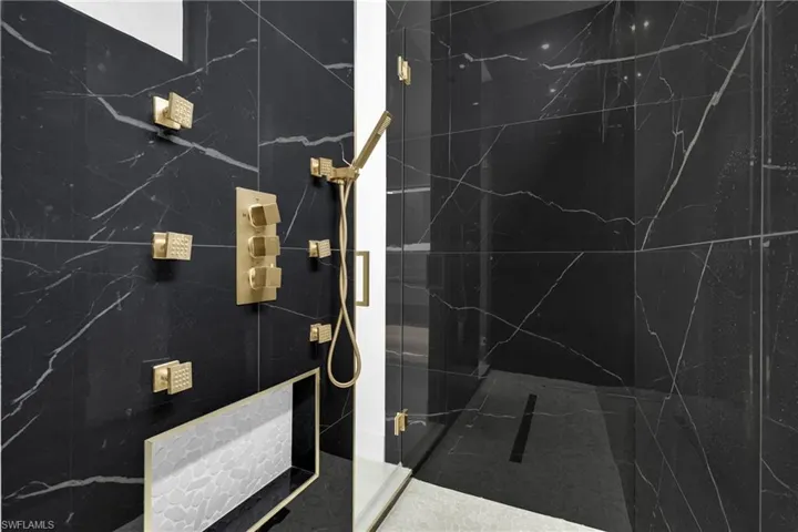 Bathroom featuring a walk in shower