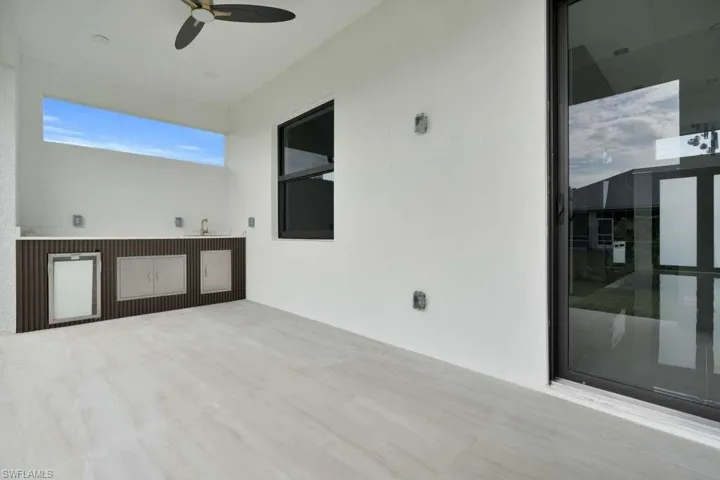 View of patio with ceiling fan