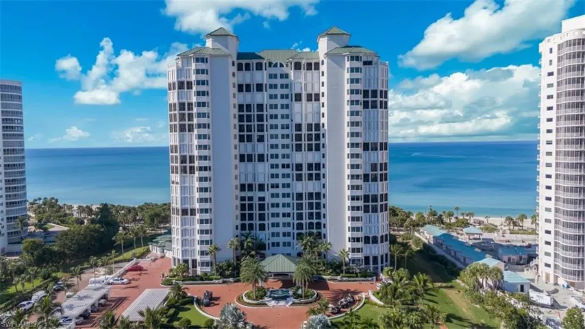 View of apartment building / complex with a water view